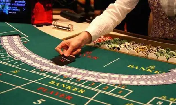 Multilingual dealers staffing arah4d login Over Under tables during evening peak hours